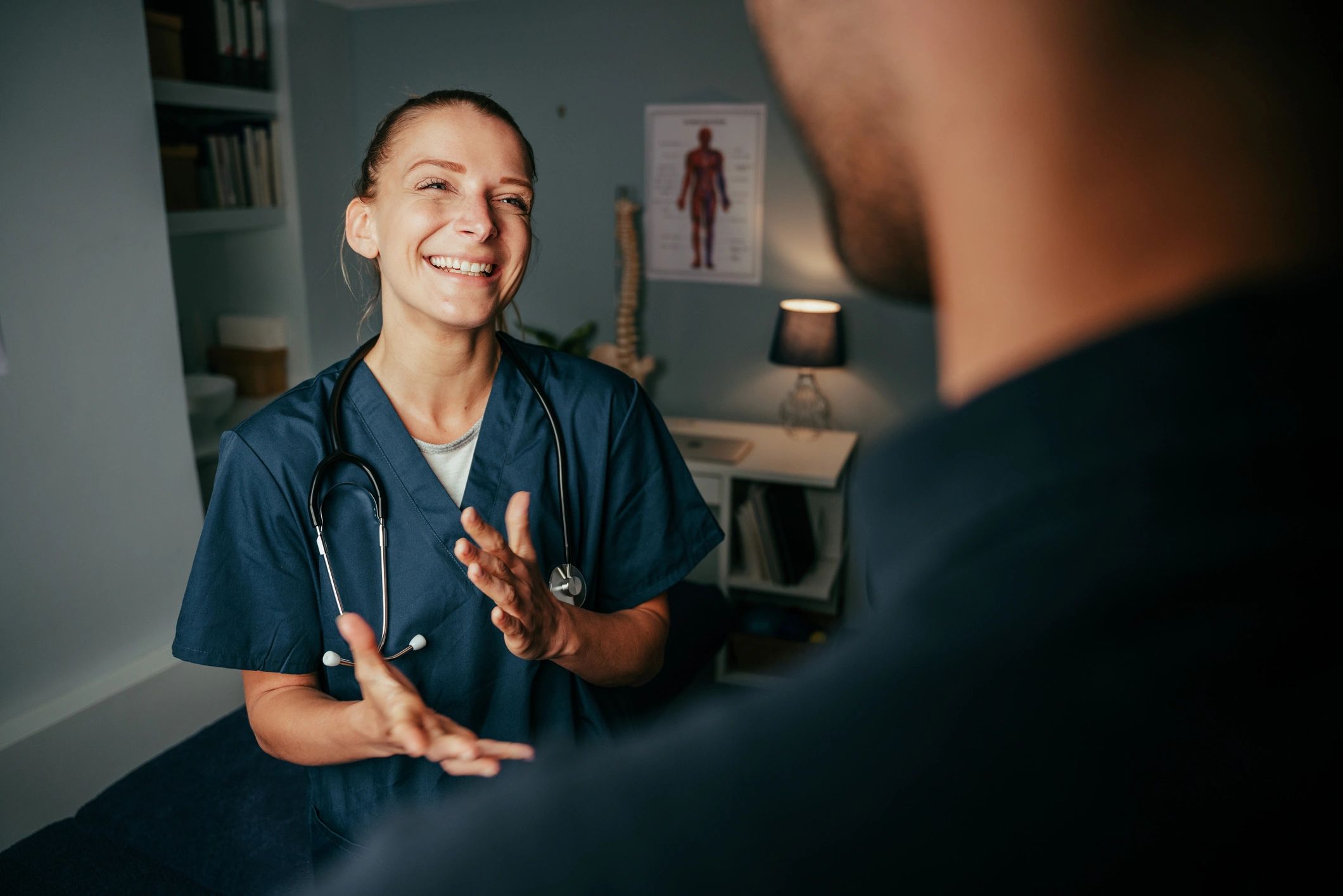 Nurse injector discussing treatment plan with patient