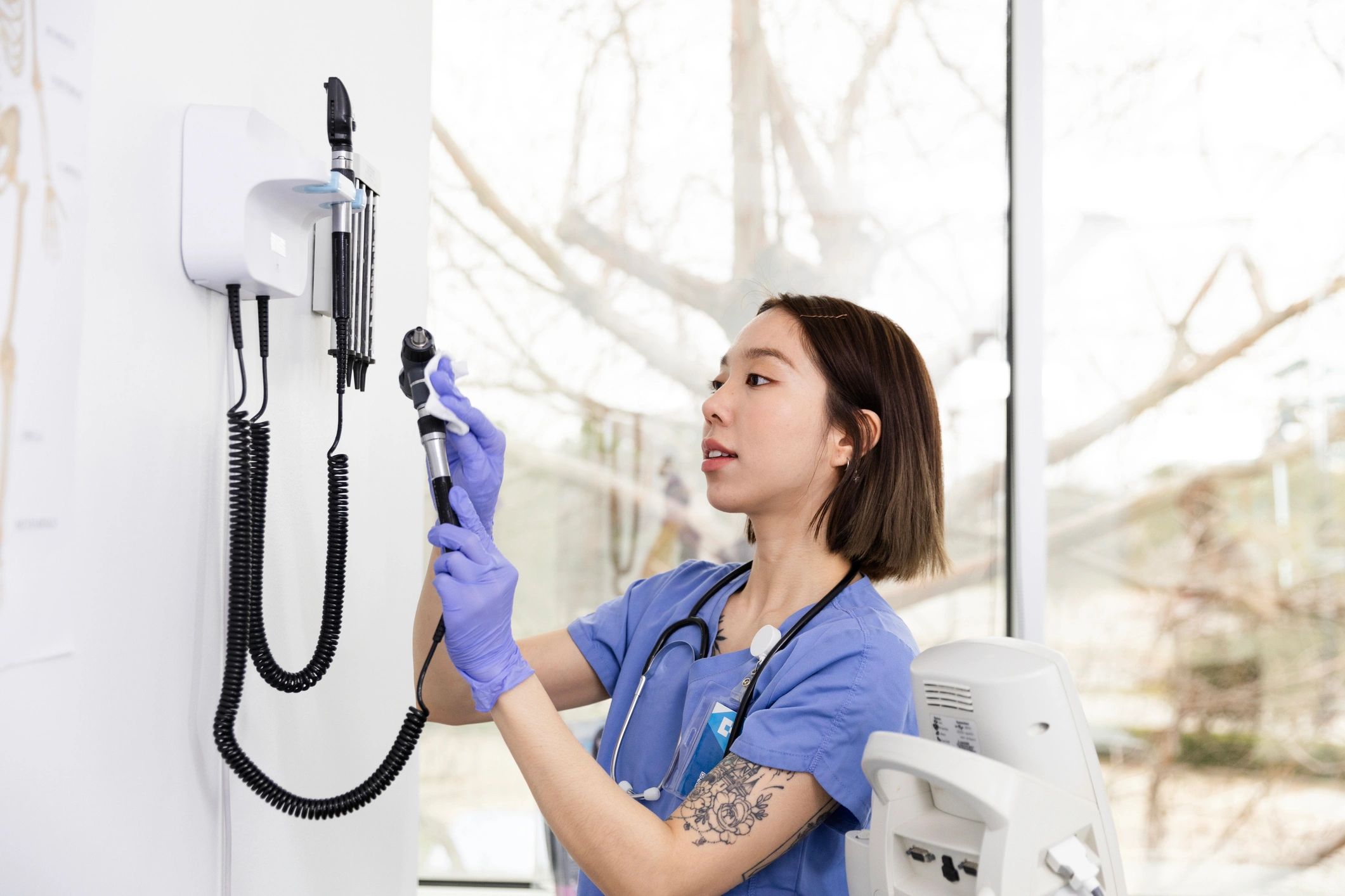 nurse performing medical screening in clinic
